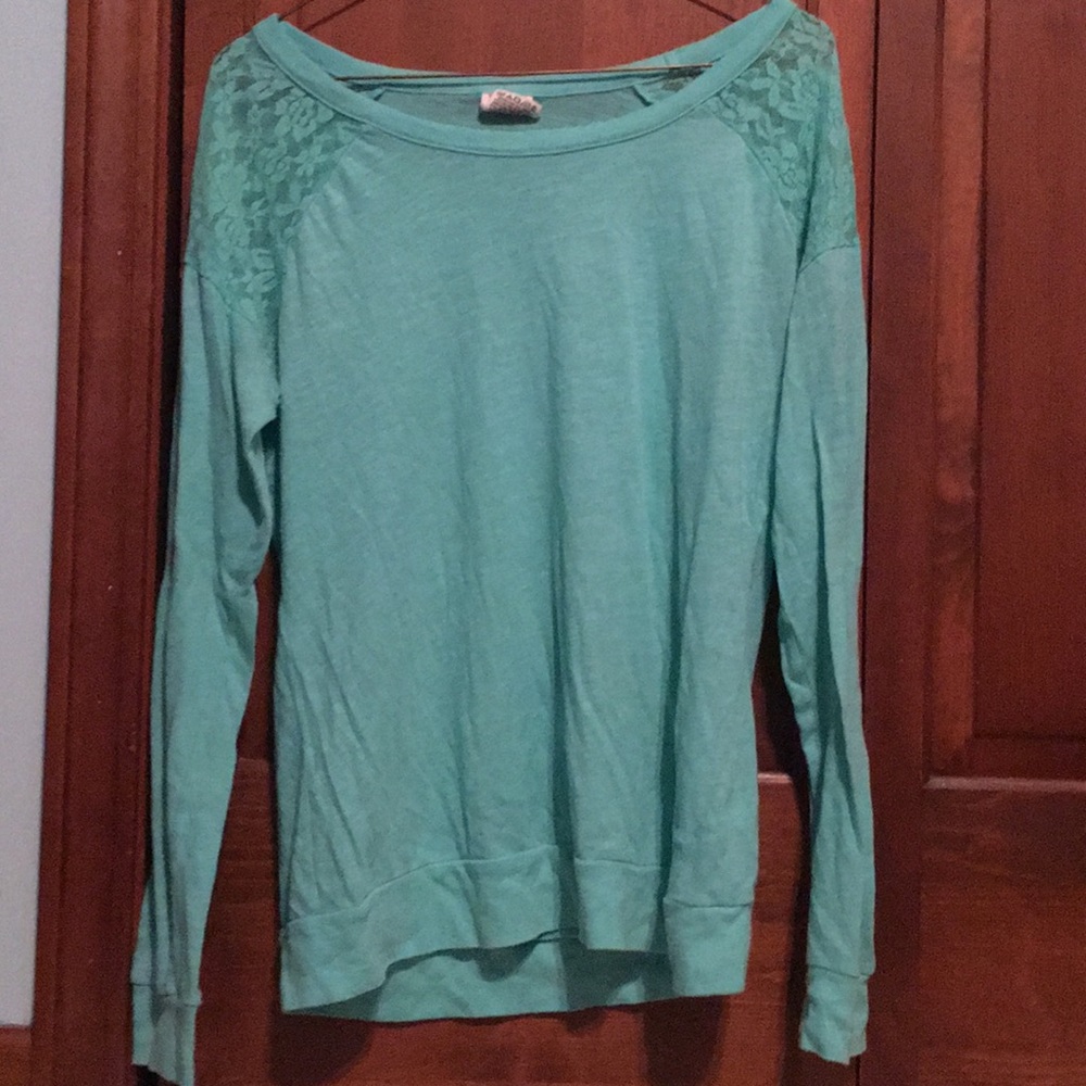 green VS pink lace shirt